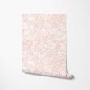 Close-up detail of soft peachy pink watercolor leaves wallpaper design, showcasing the intricate and delicate leaf patterns