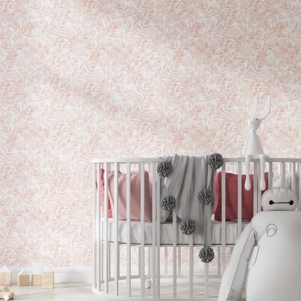 Peachy pink watercolor leaf neutral wallpaper in a baby nursery
