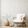 Black and white polka dot contemporary wallpaper in a living room