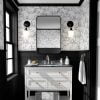 Fun black and white elephant wallpaper in a kids bathroom