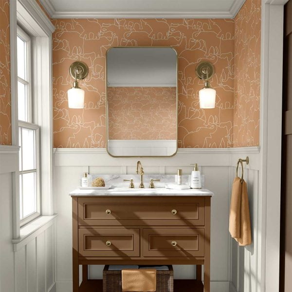 Boho burnt orange elephant wallpaper in a kids bathroom