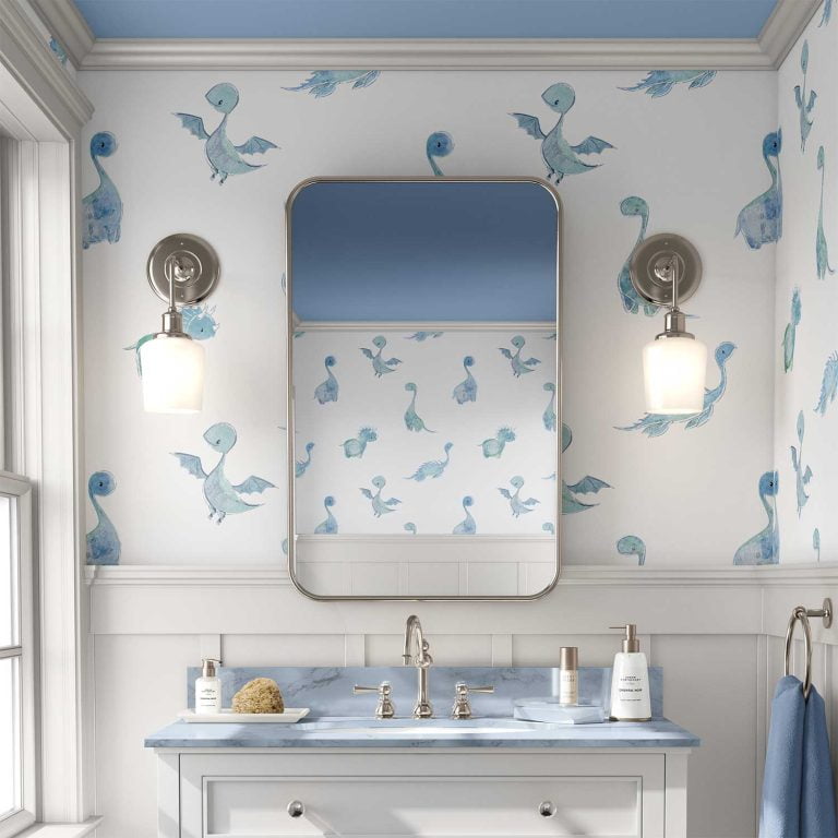 Baby blue dinosaur wallpaper in a kids bathroom, available in vinyl, paper, or fabric peel and stick options