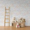 Dinosaur wallpaper in modern contemporary design with orange, gray, blue, mustard, and white colors in a kids playroom.