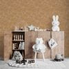 Contemporary burnt orange elephant wallpaper in a playroom