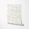 Dinosaur wallpaper for kids in beige, greens, and browns.