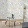 Dinosaur wallpaper for kids in beige, greens, and browns.