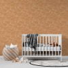 Contemporary orange bohemian elephant wallpaper in a baby nursery