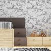 Contemporary black and white elephant wallpaper in a playroom