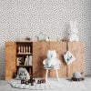 Black and white polka dot contemporary wallpaper in a child's room