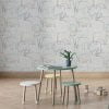 Contemporary grey, yellow, and white elephant wallpaper in a playroom