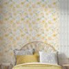 Yellow watercolor peony floral wallpaper in a bedroom