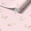 Close-up of pink puppy dog wallpaper design.