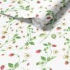 Close-up of strawberry field floral wallpaper design
