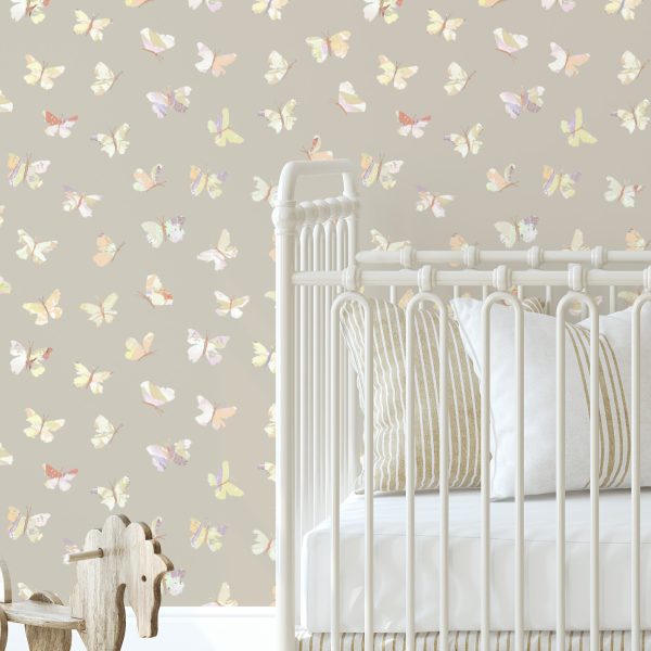 Modern kids’ room with Boho Butterfly Beige Wallpaper, rattan furniture, and neutral boho decor.