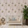 Crib wall with elegant pink bunny wallpaper